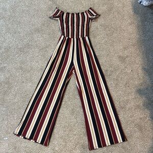 Rue 21 jumpsuit. Fitting for tall girls. Maroon, tan, black, and white.